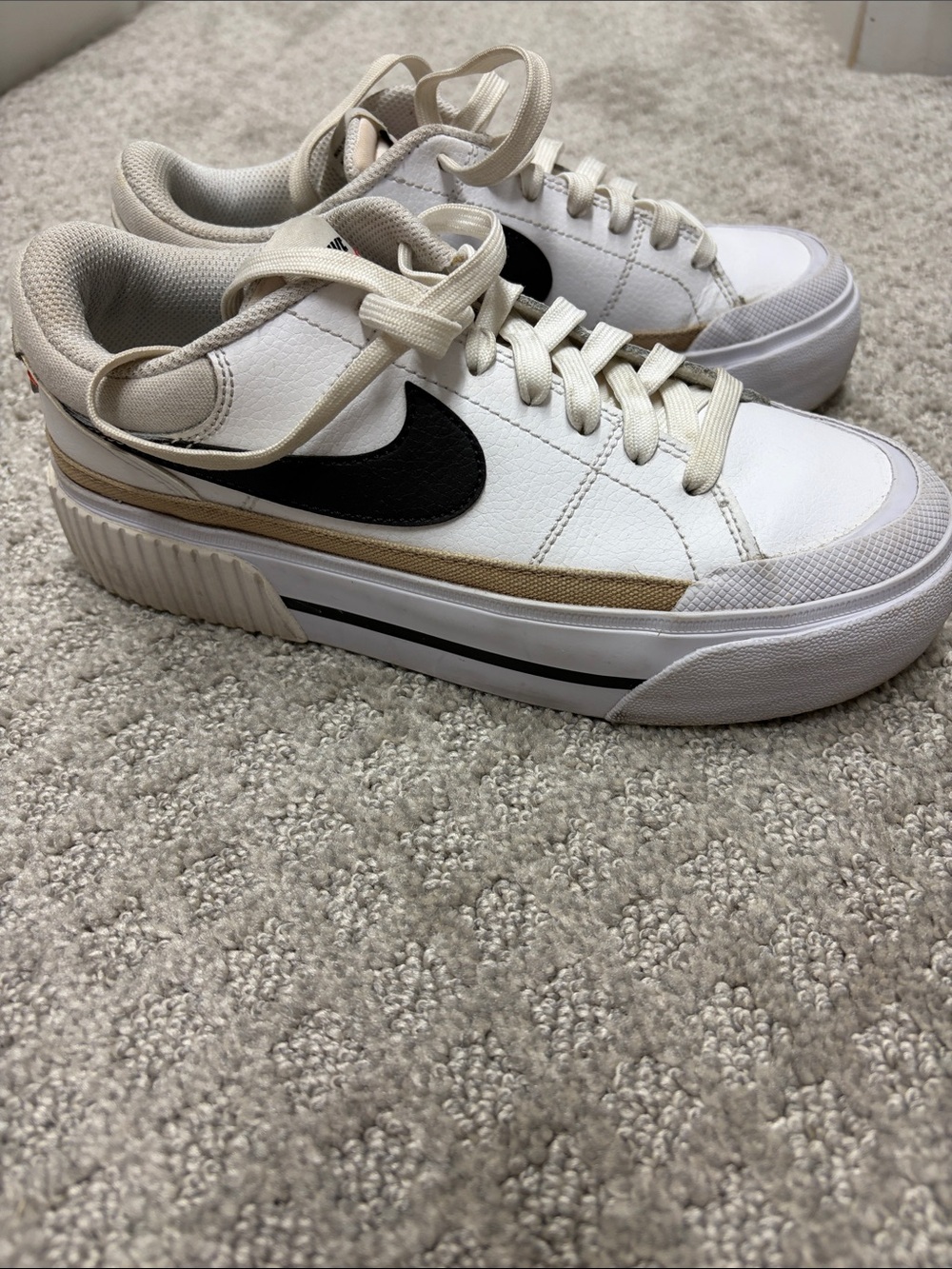 Nike Women’s White Sneakers with Black Swoosh